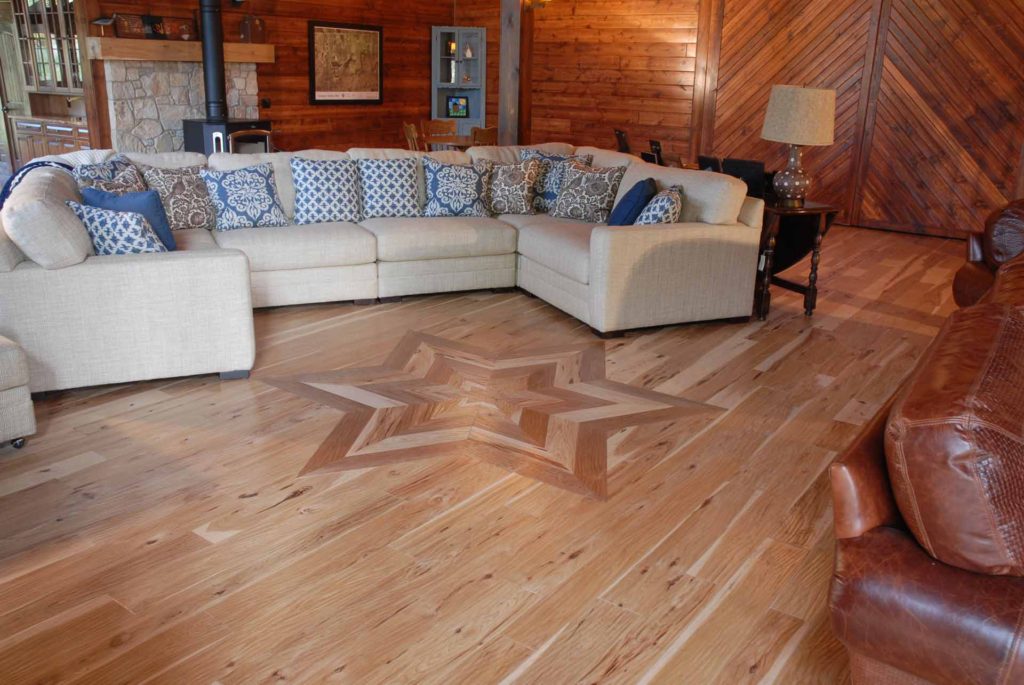 living room hardwood floor with star pattern inset